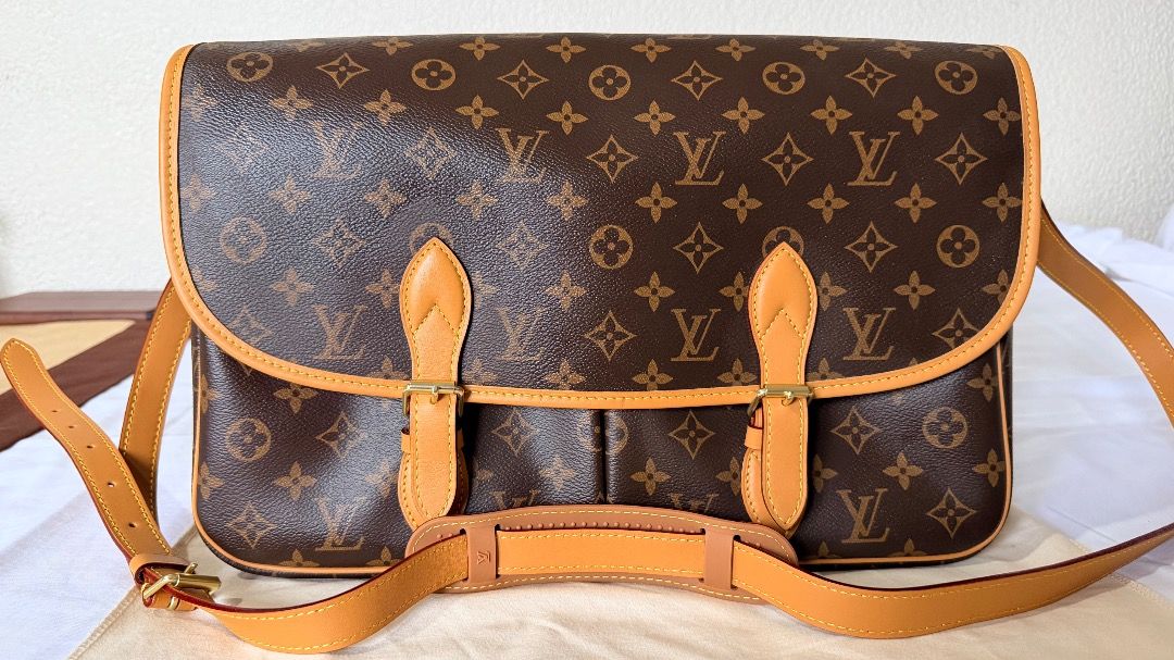 Louis Vuitton Monogram Gibecière MM (Category: Luxury Bags & Wallets) located in Caloocan City. Submitted by prof_music1979 (Listing ID 1454387026, Image 1). Description: Model: Louis Vuitton Gibecière MM Model/Reference: M42247 Material: Monogram coated canvas + natural cowhide/vachetta leather trim Color: Classic Monogram Brown Origin seen on your stamp: Made in France Style: Vintage unisex messenger / crossbody bag.
