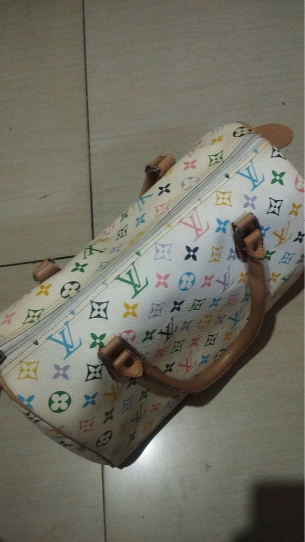Louis Vuitton Monogram Multicolore Speedy Bag (Category: Luxury Bags & Wallets) located in Bauang. Submitted by drie_02 (Listing ID 1454511274, Image 1). Description: - Classic Louis Vuitton Speedy bag - Iconic Monogram Multicolore print - Leather handles and trim - Zipper closure - Interior with LV monogram lining - A statement piece for your collection.