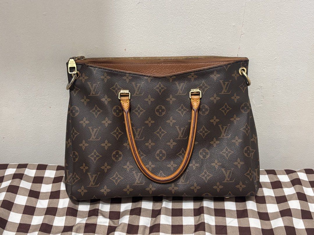 Louis Vuitton Pallas Tote Monogram (Category: Luxury Bags & Wallets) located in Pasig City. Submitted by barbiegyal (Listing ID 1454506420, Image 1). Description: Disclaimer! Item is thrifted and has flaws. Please authenticate at your own discretion.See photos for details. -Hardware: Gold with scatches/fading -Monogram canvas and leather -Spacious interior -Working zipper and magnet closure -Negotiable .