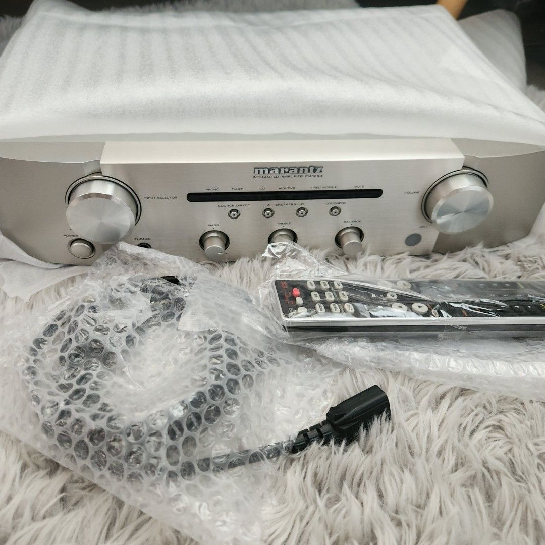 Marantz Stereo Integrated Amplifier with Remote (Category: Soundbars, Speakers & Amplifiers) located in Manila. Submitted by racz03 (Listing ID 1454374862, Image 2). Description: Marantz pm5003 Integrated Amplifier. In Excellent Working & Presentable Condition. With Remote Control. With Phono input For your Turntable. Operating Power Voltage 100V Impedance 4-8 Ohms 55 watts + 55 watts 4 Ohms 40 watts + 40 watts 6 Ohms Weight- 6.7 kilograms.