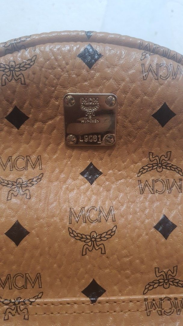 Mcm Cognac Backpack (Category: Luxury Bags & Wallets) located in Manila. Submitted by togodbethegloryteamjesus (Listing ID 1454405151, Image 2). Description: Preloved Backpack Cognac design turnable screws God Bless Us All🙏💕.