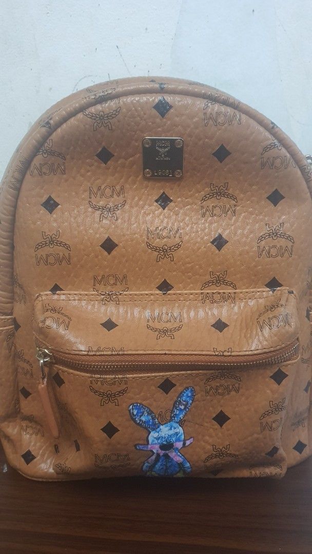 Mcm Cognac Backpack (Category: Luxury Bags & Wallets) located in Manila. Submitted by togodbethegloryteamjesus (Listing ID 1454405151, Image 1). Description: Preloved Backpack Cognac design turnable screws God Bless Us All🙏💕.