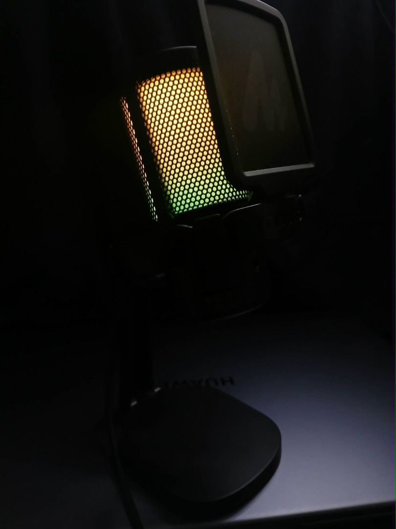 Microphone (Maono DGM20 Model) (Category: Microphones) located in Makati City. Submitted by reyginnn (Listing ID 1454398290, Image 2). Description: - Maono USB Microphone with vibrant RGB lighting effects - Choose from Blue, Red, or Rainbow color options - Comes complete with a sturdy stand and pop filter - Perfect for streaming, gaming, and recording - Easy plug-and-play setup for computers.