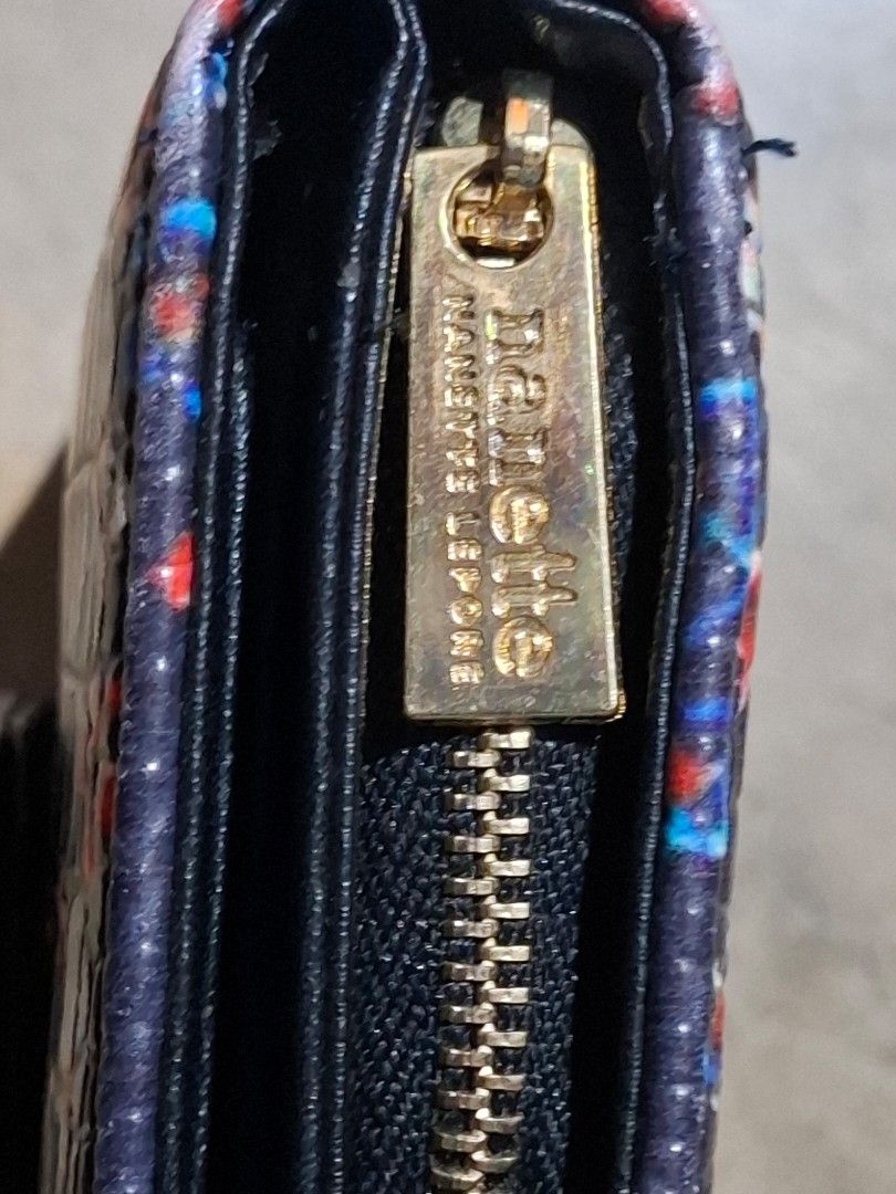 Nanette Lepore Floral Wallet (Category: Wallets & Card holders) located in Manila. Submitted by key_pii (Listing ID 1454519650, Image 3). Description: 150 Origin: Canada Issue: Small peeling at the back, and minor cracks and peeling inside the wallet MOP: Gcash MOD: Jnt Preloved.