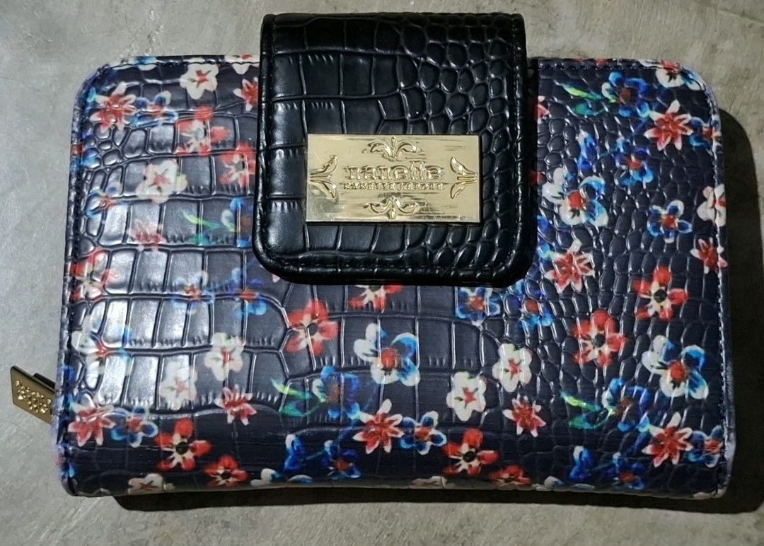 Nanette Lepore Floral Wallet (Category: Wallets & Card holders) located in Manila. Submitted by key_pii (Listing ID 1454519650, Image 1). Description: 150 Origin: Canada Issue: Small peeling at the back, and minor cracks and peeling inside the wallet MOP: Gcash MOD: Jnt Preloved.
