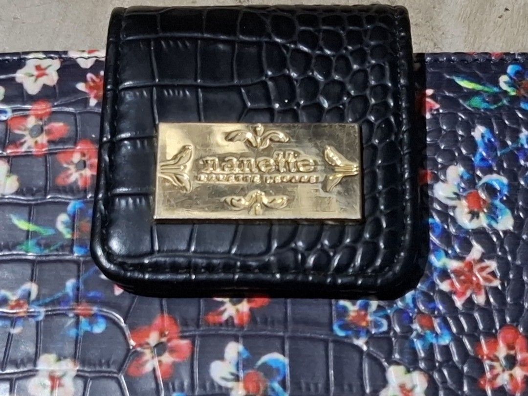 Nanette Lepore Floral Wallet (Category: Wallets & Card holders) located in Manila. Submitted by key_pii (Listing ID 1454519650, Image 2). Description: 150 Origin: Canada Issue: Small peeling at the back, and minor cracks and peeling inside the wallet MOP: Gcash MOD: Jnt Preloved.