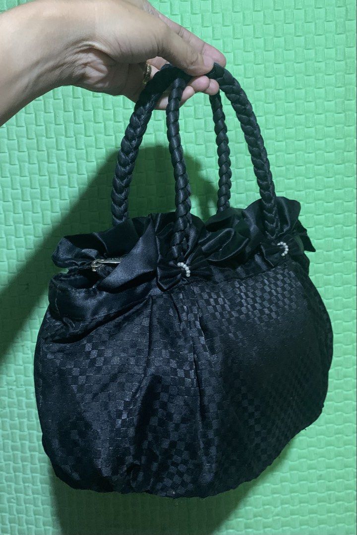 NaRaYa Black Checkerboard Satin Gathered Handbag (Category: Shoulder Bags) located in Carigara. Submitted by spark2503 (Listing ID 1454548696, Image 2). Description: - Brand: NaRaYa - Material: Black satin with checkerboard pattern - Design: Gathered top with bow details - Handles: Braided - Closure: Zipper - Versatile: Ideal for everyday wear or special occasions.