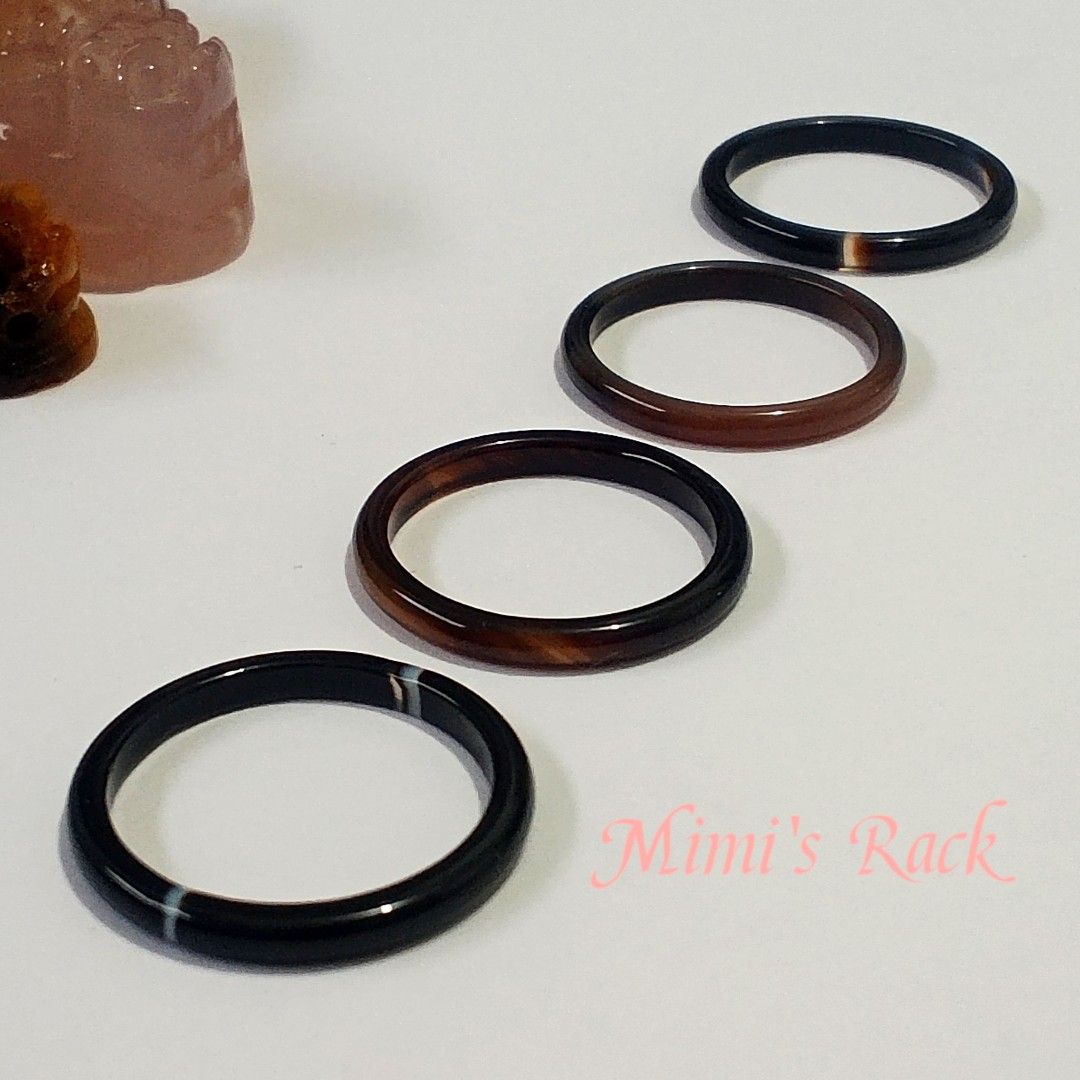 Natural Agate Ring with Certificate of Authenticity (Category: Rings) located in Taguig. Submitted by mimisrack (Listing ID 1454544750, Image 1). Description: 🖤Simple, elegant, and effortlessly timeless. These polished agate rings feature a sleek, smooth band with deep black and dark brown tones. Under light, some pieces reveal a beautiful warm reddish-brown translucency, adding depth and character to the otherwise dark appearance. -Each ring ha