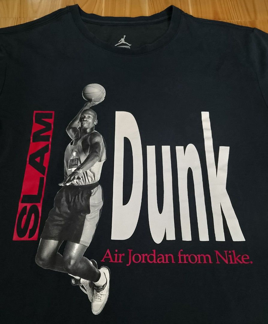 Nike Jordan Slam Dunk T-Shirt (Category: Tshirts & Polo Shirts ) located in San Jose del Monte. Submitted by azetor (Listing ID 1454377690, Image 2). Description: - Black Nike Jordan T-shirt - Features Michael Jordan mid-dunk graphic with 'Slam Dunk' text - Made with Dri-FIT material for comfort and performance - Size: Medium on tags - Ideal for any basketball enthusiast - measurements - chest 19.5 - length 27 - great condition - color rate 9.5/1