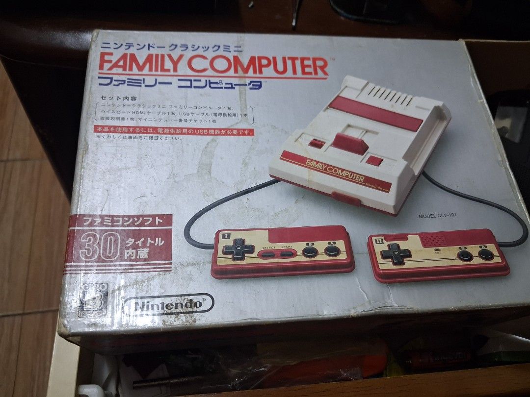Nintendo Family Computer Mini Console CLV-101 with 30 Games (Category: Nintendo) located in Taguig. Submitted by sonnydela.cruz (Listing ID 1454370741, Image 1). Description: - Nintendo Family Computer Mini (Model CLV-101) - Includes 2 controllers - Comes with 30 built-in classic games - Ideal for retro gaming enthusiasts - Please check photos for exact condition no hdmi and usb power supply .