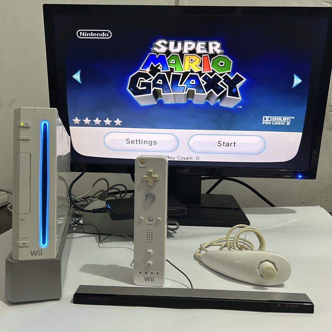 Nintendo Wii: Complete Set (Full of Games) (Category: Nintendo) located in Quezon City. Submitted by argamenest (Listing ID 1454370118, Image 1). Description: Nintendo Wii: Complete Set (Full of Games) ‎ ‎✅ Complete Set ‎✅ No issues, dents lang, ✅ lalaruin nalang ‎✅ Works without internet ‎✅ FREE drive with Full of Games ‎ ‎INCLUSIONS ‎1x Wii Console ‎1x Wii Motion Sensor Bar ‎1x Wii Stand ‎1x Wii Sensor Bar Stand ‎1x Wii Remote ‎1x Wii Nunchuk ‎