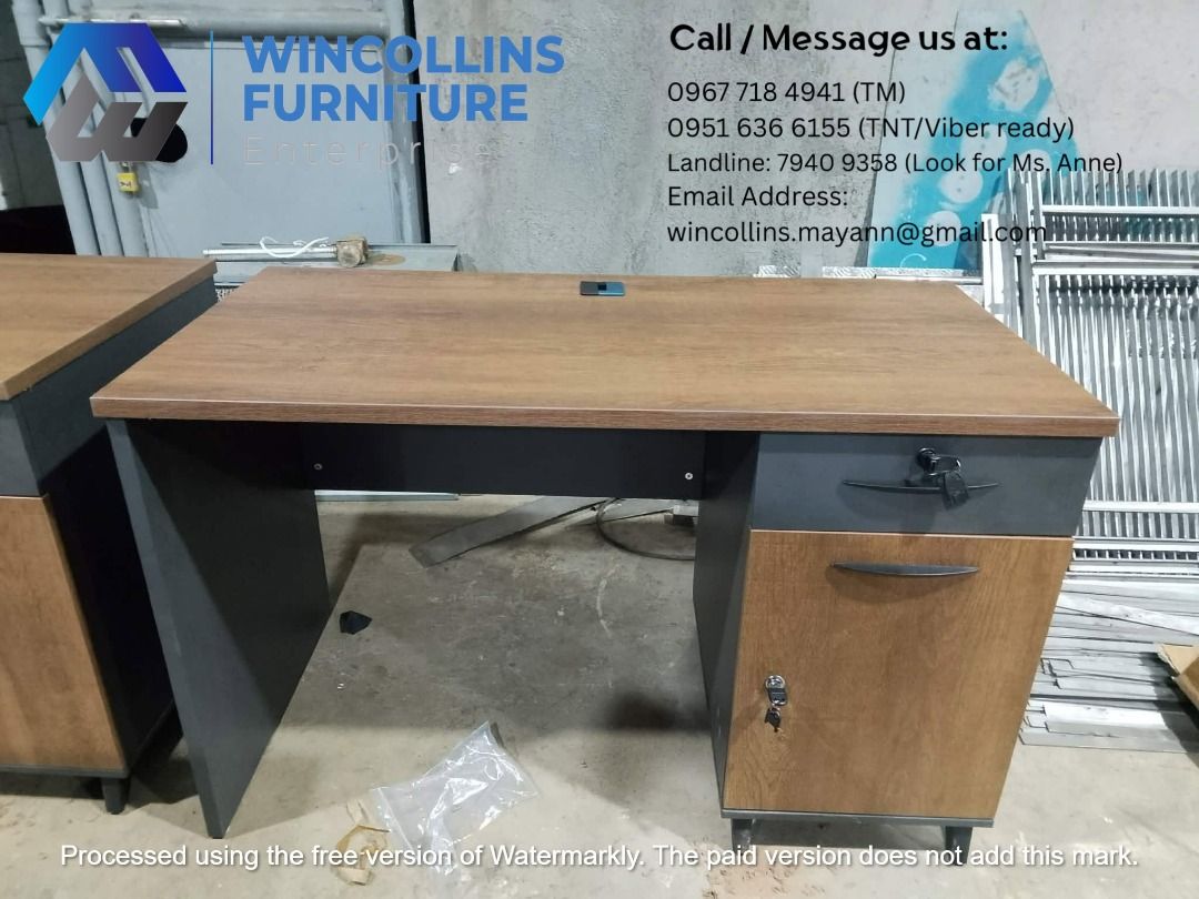 Office Table with side cabinet/drawers, Work Table (Category: Office Furniture & Fixtures) located in Quezon City. Submitted by wincocami_ (Listing ID 1454382194, Image 1). Description: Melamine scratch proof Office table with two tone color side drawer/cabinet Color: Brown wood top and gray modesty Size: 120cmLx60cmDx76H.