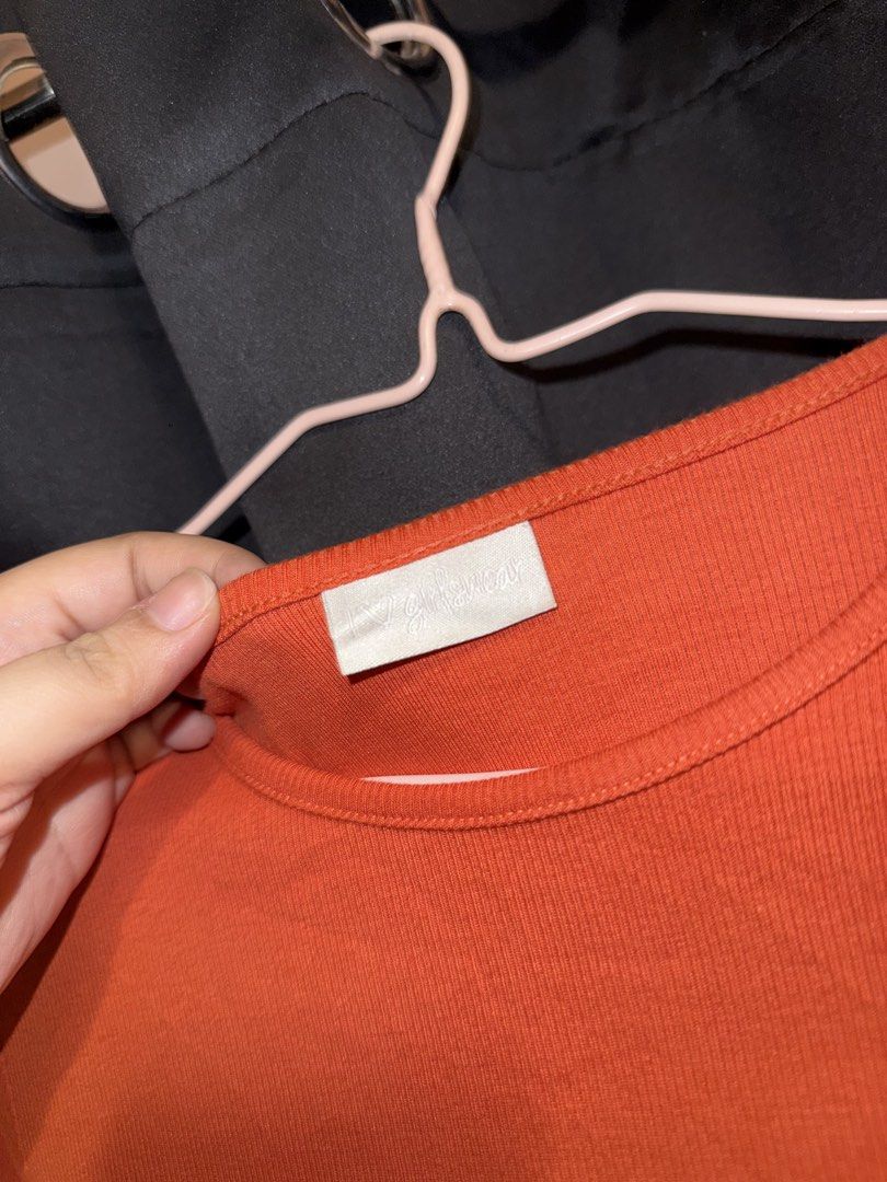 Orange Ribbed Cropped Long Sleeve Top (Category: Longsleeves) located in Quezon City. Submitted by lexix (Listing ID 1454486132, Image 2). Description: - Orange ribbed cropped long sleeve top - Soft and comfortable material - Classic round neckline - Versatile for layering or wearing on its own - Easily pairs with jeans or skirts.