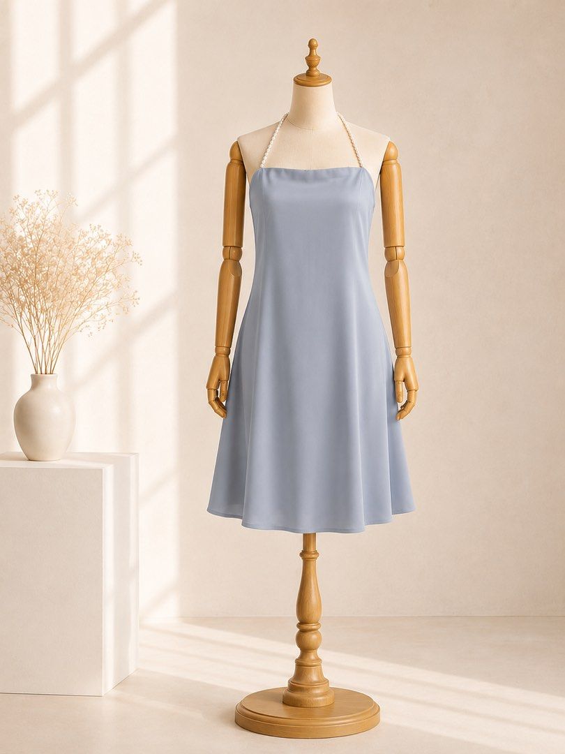 Pearl Strap Halter A-Line Dress | Size: Medium (Category: Dresses) located in Cavite. Submitted by heirlooms_and_treasures (Listing ID 1454388947, Image 2). Description: Size: Medium on tag Color: Dusty Blue / Light Blue Pattern: Solid Plain ✨ Make a chic and sophisticated statement at any event with this elegant dusty blue dress featuring a luxurious pearl-beaded halter strap. - Elegant neckline paired with a delicate faux-pearl halter strap - F