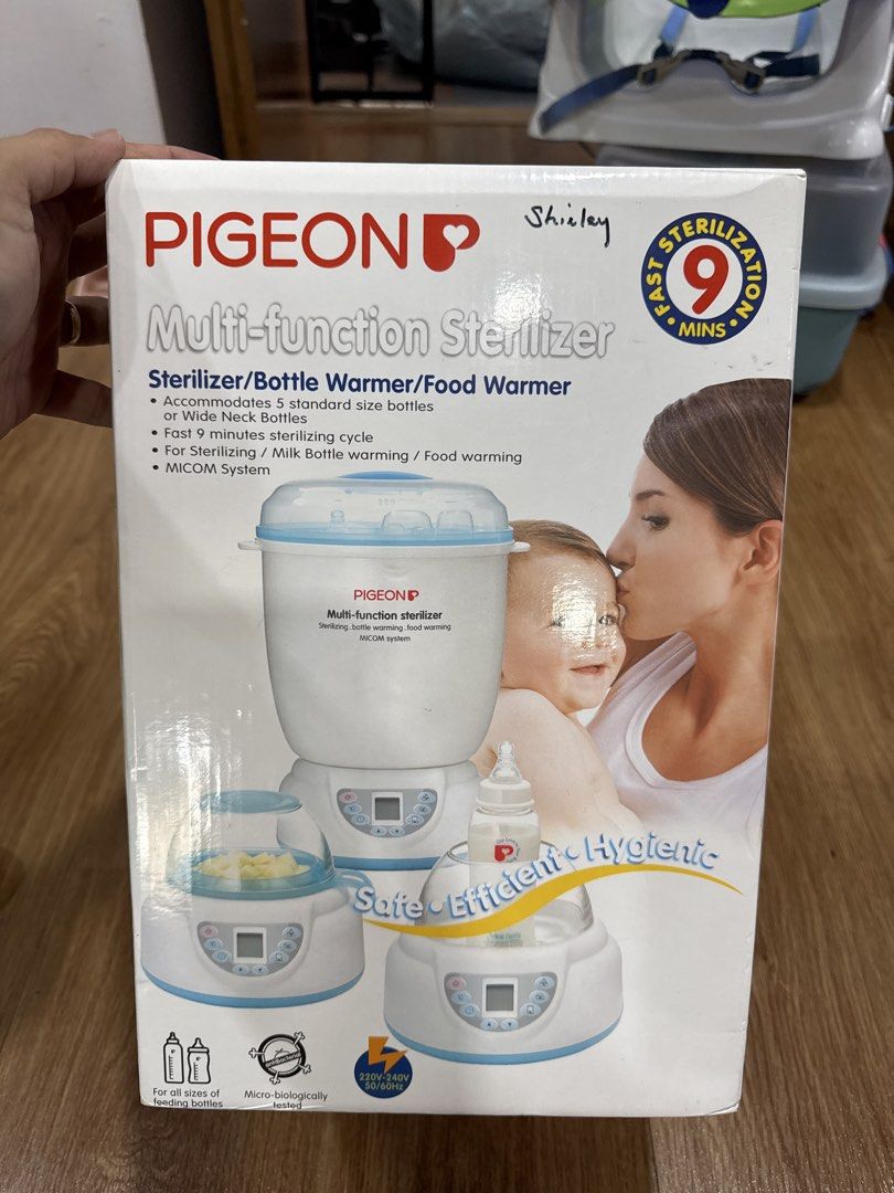 Pigeon Multi-function Sterilizer (Category: Breastfeeding & Bottle Feeding) located in Singapore. Submitted by laconic84 (Listing ID 1454472475, Image 1). Description: - Brand: Pigeon - Model: Multi-function Sterilizer - Functions: Sterilizing, Bottle Warming, Food Warming - Sterilization Cycle: Fast 9 minutes - Capacity: Accommodates up to 5 standard or side-neck bottles - Features: MICOM system - Condition: Good, pre-loved - Suitable for all ty
