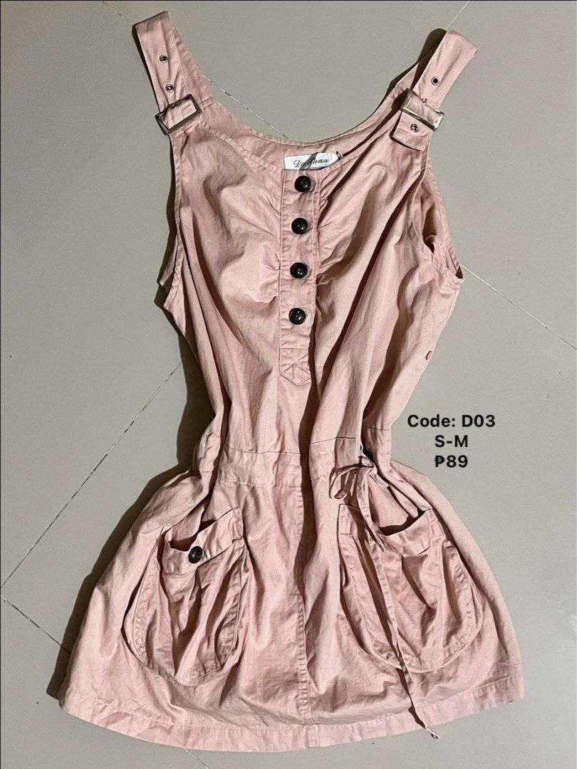 Pink Button-Up Pinafore Dress (Category: Dresses) located in Iloilo. Submitted by geybrieeeel (Listing ID 1454438425, Image 1). Description: - Cute pink pinafore dress - Adjustable straps with buckles - Button-up front - Drawstring waist for a customizable fit - Two large front pockets with button details - Ideal for casual wear - Item code: D03.