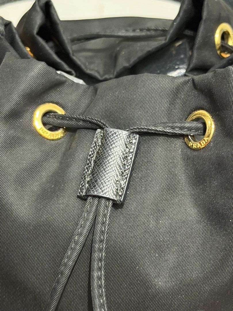 Prada Duet Re-Nylon Bucket Bag (Category: Luxury Bags & Wallets) located in Manila. Submitted by luxe.shop (Listing ID 1454391848, Image 3). Description: Comes with: Dust bag Information Card.