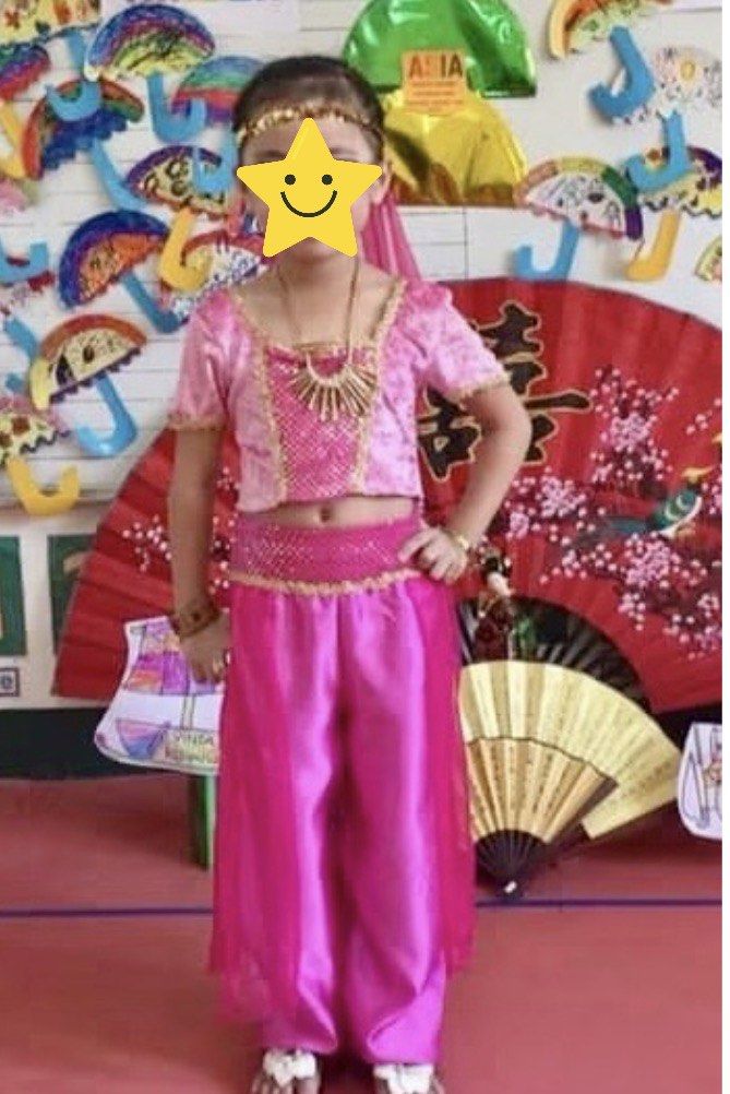 Princess Jasmine Costume (Category: Babies & Kids Fashion) located in Quezon City. Submitted by frappes (Listing ID 1454432700, Image 3). Description: - Aladdin-inspired Pink Princess Costume - Set includes: sparkly top with gold trim, pants with sheer overlay, and headpiece - Perfect for dress-up and parties - Made in USA - Fits sizes 4-6.