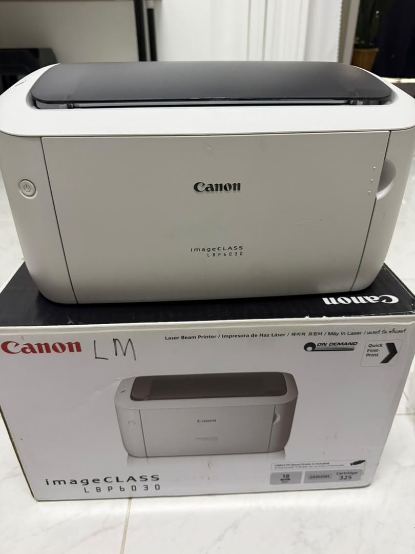 Printer (Category: Printers, Scanners & Copiers) located in Gopeng. Submitted by jutaff (Listing ID 1454373351, Image 1). Description: Canon imageCLASS LBP6030 Laser Printer ✅ Berfungsi dengan baik ✅ Boleh terus print ✅ Kabel power & USB lengkap ✅ Manual & kotak asal disertakan ✅ Sesuai untuk rumah, pejabat & pelajar ✅ Print hitam putih yang tajam Harga: RM180 cod GOPENG IPOH B.GAJAH.