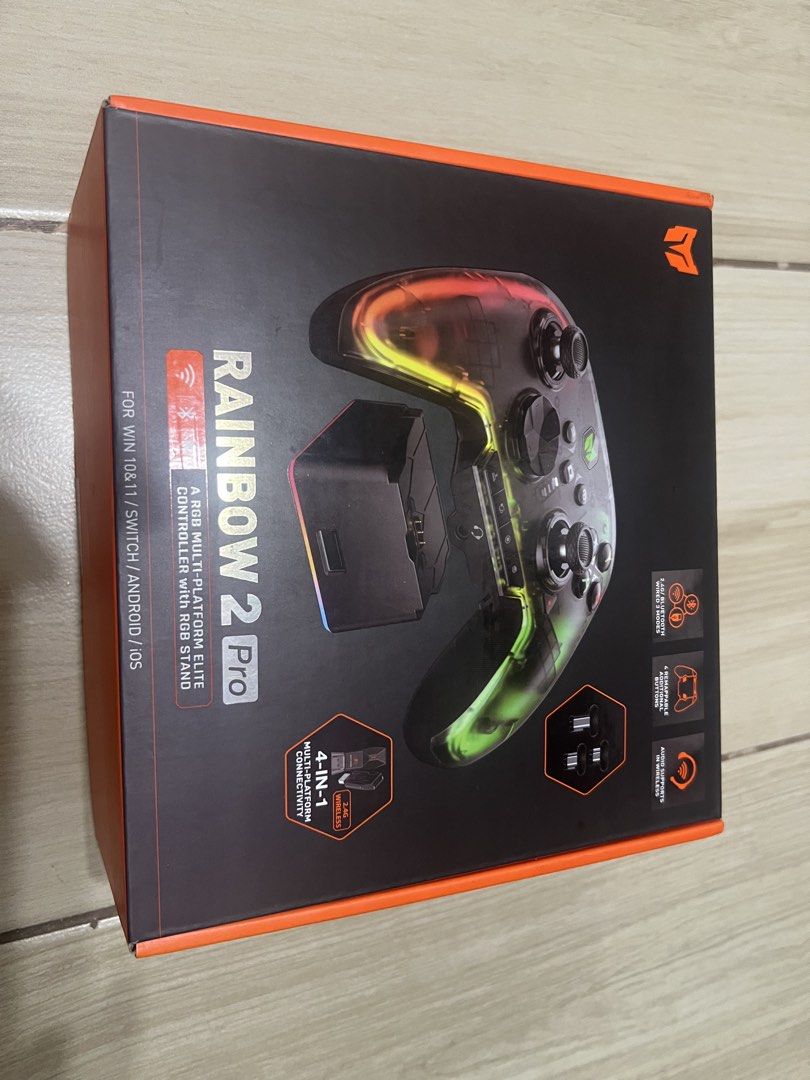 Rainbow 2 Pro RGB Multi-Platform Elite Controller (Category: Controllers) located in Quezon City. Submitted by banana.pancakes (Listing ID 1454376600, Image 2). Description: - 8BitDo Rainbow 2 Pro Elite Controller - Vibrant RGB lighting - Multi-platform: Windows, Switch, Android, iOS - 4-in-1 connectivity - Includes charging dock - Extra thumbsticks included - Perfect for gaming on any device #controller #rainbow2pro #bigbigwon.