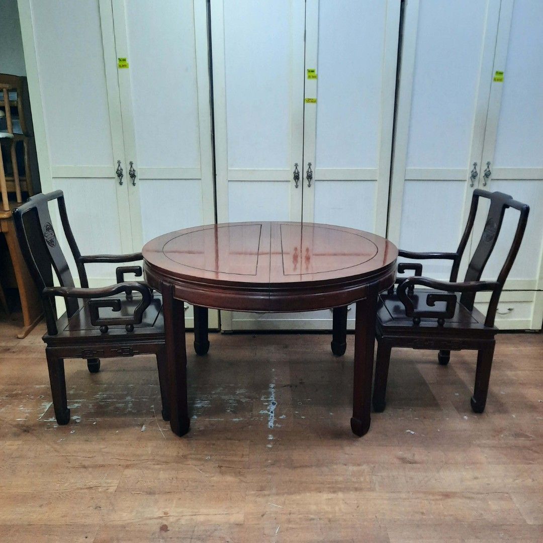 Round Wooden Dining Table with 2 Chairs (Category: Tables & Sets) located in Manila. Submitted by ivan_furnitures421 (Listing ID 1454387416, Image 2). Description: - Classic round dining table and 2 matching chairs - Rich dark wood finish - Sturdy construction - Ideal for smaller dining areas or breakfast nooks - Ready for its new home!.