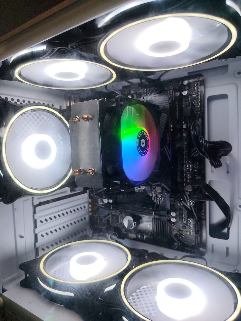 Ryzen 3 System unit (Category: Desktops) located in Las Pinas. Submitted by mikko.gomez (Listing ID 1454281308, Image 2). Description: For sale system unit 100% Zero issues Brand new condition 💯 All parts are brand new Specs: AMD Ryzen 3 3200g processor W/ Radeon vega 8 integrated graphics Gigabyte a520m-k v2 motherboard 8GB Fury beast ddr4 RAM 250GB Sandisk SSD Inplay rgb cpu cooler 5x white led fans MMA Tempered Glass Case Keytech Thunderbolt 