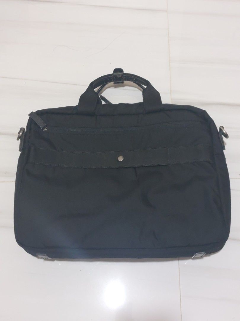 Samsonite RED Black Nylon Backpack / Briefcase (Category: Backpacks) located in Malaybalay. Submitted by mags_sofia (Listing ID 1454496504, Image 2). Description: - Black Samsonite RED backpack - Can be carried as a briefcase - Multiple zippered compartments - Made from durable nylon material - Some wear on the leather accents - Great for work or travel - has wear and tear on leather components.