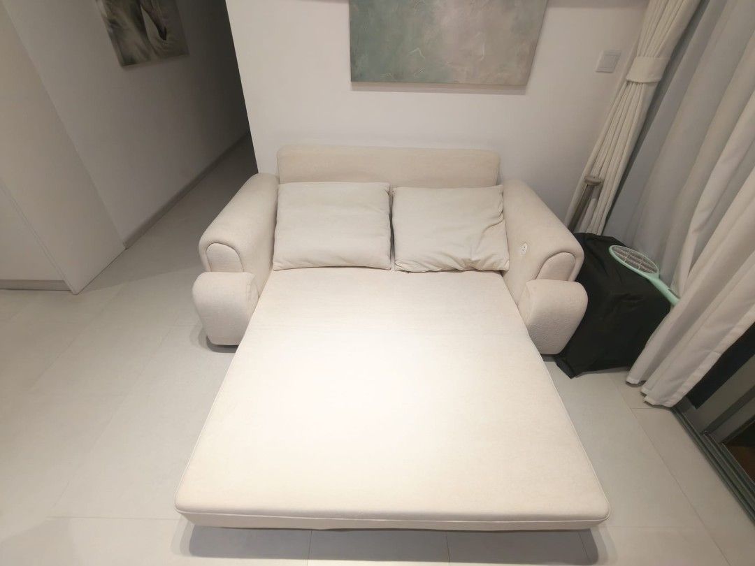 Sofa bed. (Category: Sofas) located in Singapore. Submitted by whitecrow2012 (Listing ID 1454494038, Image 3). Description: Comes with premium cat scratch proof material. length 1.75m width 0.95m.