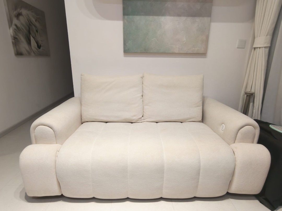 Sofa bed. (Category: Sofas) located in Singapore. Submitted by whitecrow2012 (Listing ID 1454494038, Image 2). Description: Comes with premium cat scratch proof material. length 1.75m width 0.95m.
