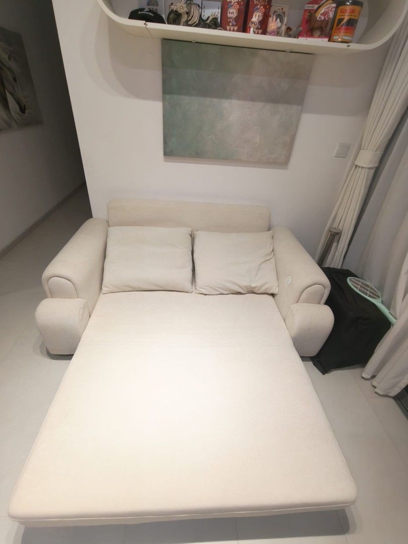 Sofa bed. (Category: Sofas) located in Singapore. Submitted by whitecrow2012 (Listing ID 1454494038, Image 1). Description: Comes with premium cat scratch proof material. length 1.75m width 0.95m.