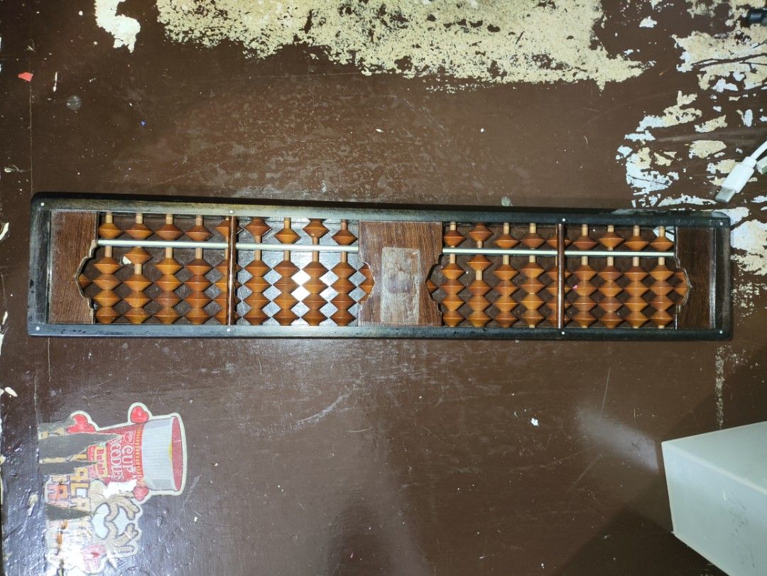 Soroban Counting Tool/Abacus (Category: Educational & Learning Toys) located in Manila. Submitted by warmshark.1ae1ea (Listing ID 1454500877, Image 2). Description: Traditional Soroban Abacus (Suanpan) ✅ Complete beads and frame ✅ Functional and ready to use ✅ Suitable for learning, teaching, decoration, or collection Good condition with normal signs of storage.