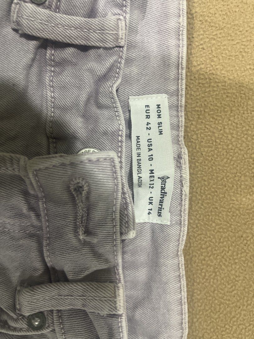 Stradivarius Mom Slim Jeans Light Purple Size UK 14 (Category: Jeans) located in Pasig City. Submitted by kakerts (Listing ID 1454532607, Image 2). Description: - Brand: Stradivarius - Color: Light Purple - Style: Mom Slim Jeans - Size: UK 14 / EUR 42 - Fit: Straight Leg - Features: Classic 5-pocket styling, Button and zip fly closure - Origin: Made in Bangladesh - Occasion: Great for casual wear.