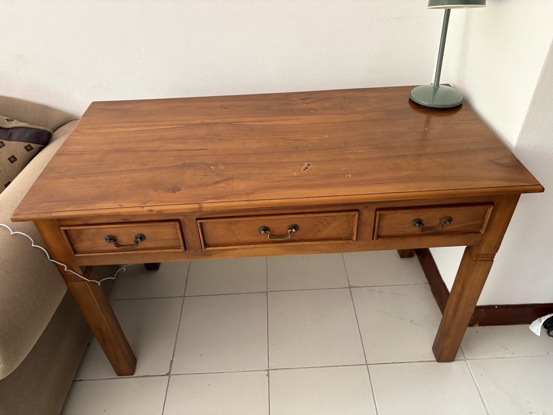 Study table (Category: Tables & Sets) located in Singapore. Submitted by anumol (Listing ID 1454395169, Image 1). Description: Solid Teak wood. Slightly negotiable .