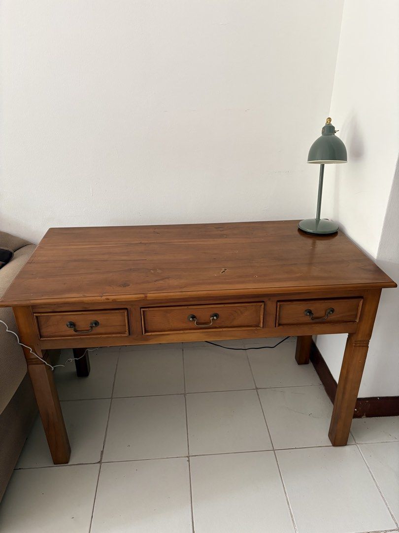Study table (Category: Tables & Sets) located in Singapore. Submitted by anumol (Listing ID 1454395169, Image 2). Description: Solid Teak wood. Slightly negotiable .