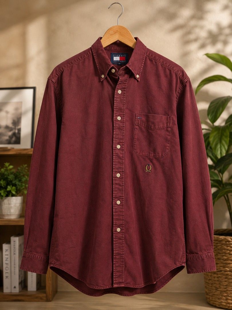 Tommy Hilfiger Burgundy Button Down Shirt M (Category: Tshirts & Polo Shirts ) located in Tubod. Submitted by the_prime1998 (Listing ID 1454505690, Image 1). Description: - Classic Tommy Hilfiger button-down shirt - Color: Burgundy - Features embroidered crest logo on chest pocket - Material: 100% Cotton - Made in Thailand - Size: Medium (M) - Ideal for casual and smart-casual occasions.