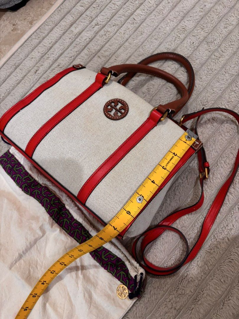 Tory Burch Canvas & Leather Tote Bag Red Trim (Category: Luxury Bags & Wallets) located in Paranaque City. Submitted by mjclosetph17 (Listing ID 1454559572, Image 1). Description: 👜 Tory Burch Blake Canvas Small Tote – Natural / Tory Red Condition: Preloved – excellent condition ✨ Color: Natural / Tory Red Material: Woven canvas with leather trim & handles Style: Structured small tote with signature Double-T logo patch 📏 Approx. Size: • 10.5” L