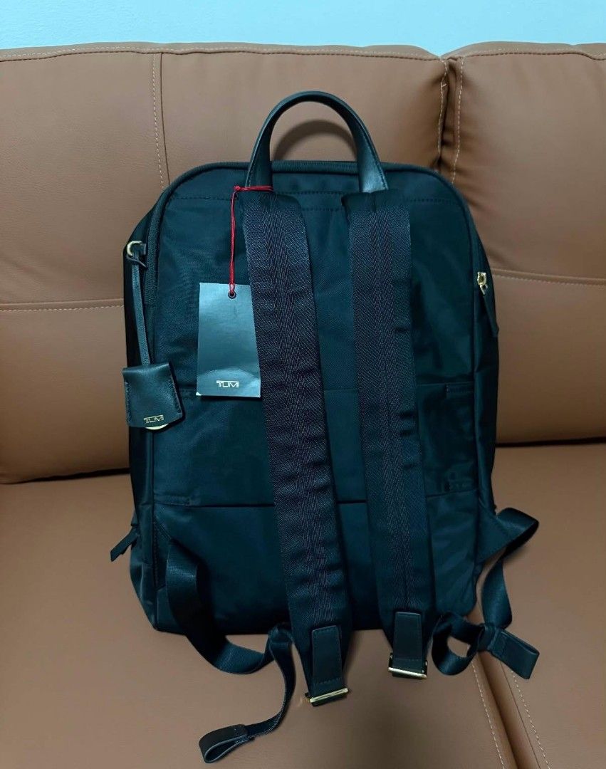 Tumi Bexley Backpack Black Nylon Leather Trim (Category: Backpacks) located in Manila. Submitted by jayveecatu14021 (Listing ID 1454460243, Image 3). Description: - Brand: Tumi - Model: Bexley Backpack - Color: Black - Material: 95% Nylon, 5% Leather Trim - Lining: Polyester - Dimensions: 16.5" x 12" x 6.5" - Laptop Compartment: Fits up to 16.25" laptop - Features: Multiple interior pockets, Gold hardware - Ideal for: Work, travel, everyday use.