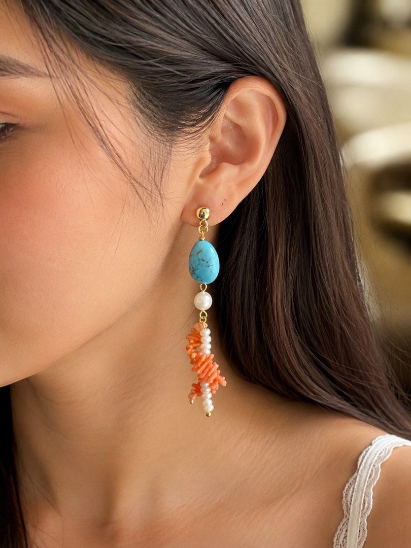 Turquoise Coral Akoya Pearl Dangle Earrings (Category: Earrings) located in Pasig City. Submitted by Jo.JewelsofVVM (Listing ID 1454540366, Image 2). Description: These earrings are a poetic harmony of sky, sea, and earth; where the unique serene blue of rare Robin’s egg turquoise meets the soft luminosity of Japanese Akoya, with the intertwined string of freshwater pearls and the warm, coral hues of Japanese branch corals. Turquoise has long bee