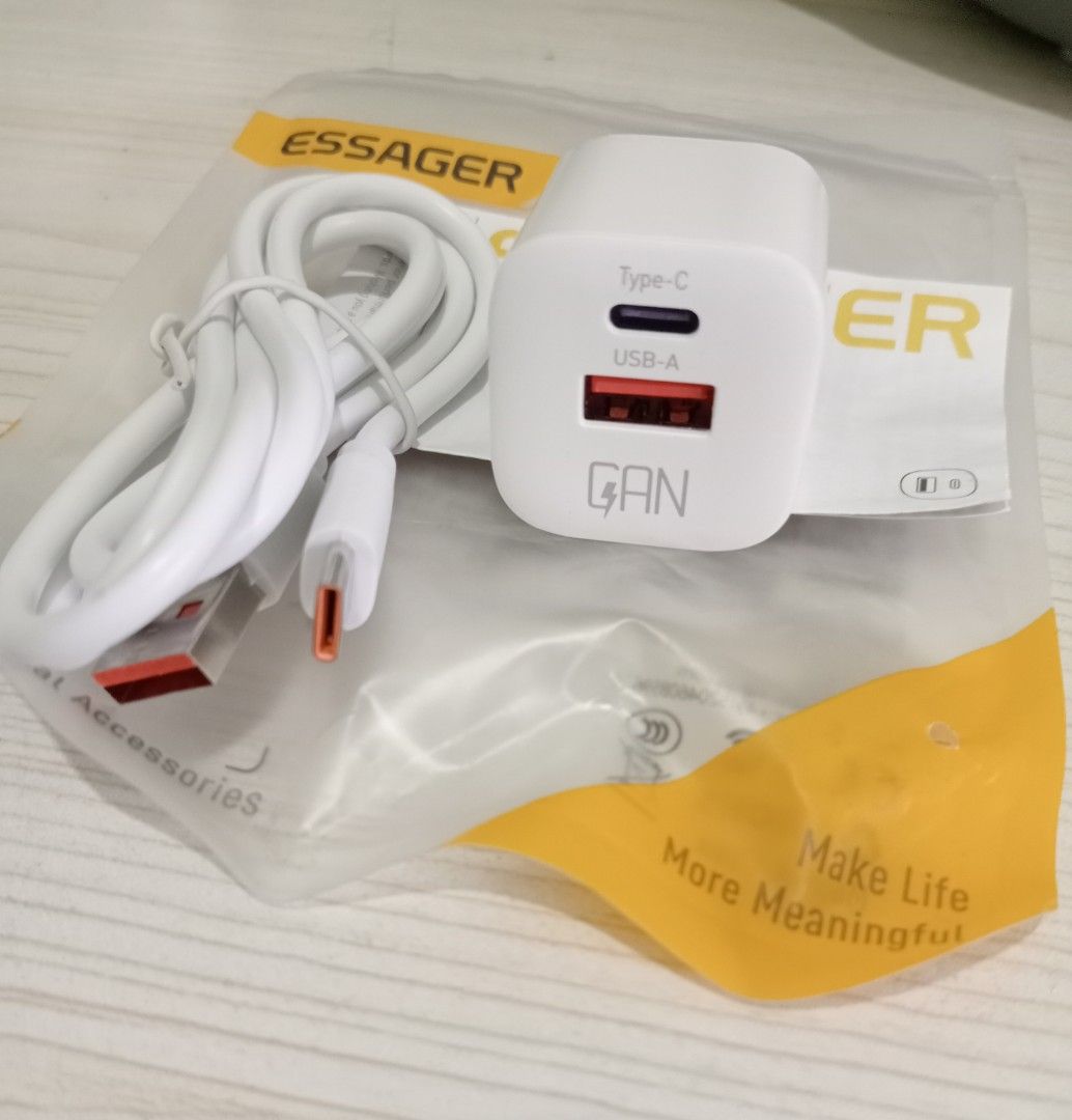 Type C Dual port fast charger (Category: Chargers & Cables) located in Makati City. Submitted by redisell (Listing ID 1454553461, Image 2). Description: - Brand: ESSAGER - Color: White - Ports: 1x Type-C, 1x USB-A - Technology: GAN for fast charging - Compact design.