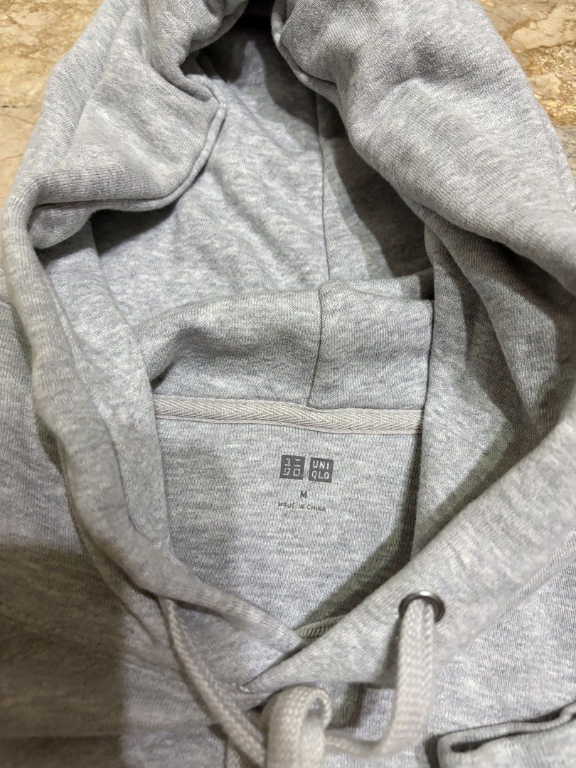 UNIQLO Sweat Pullover Long Sleeve Hoodie (Category: Coats, Jackets and Outerwear) located in Manila. Submitted by abuyforyou (Listing ID 1454550637, Image 3). Description: 10/10 condition, well-maintained. Worn only once. No flaws..