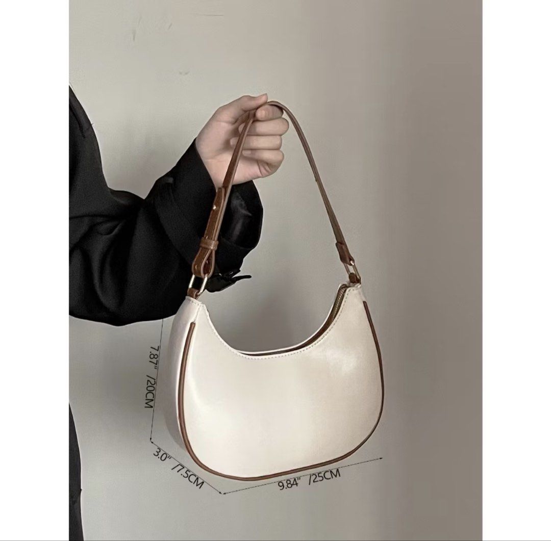 White Crescent Shoulder Bag with Brown Trim (Category: Shoulder Bags) located in Paranaque City. Submitted by ryujaesu (Listing ID 1454502700, Image 1). Description: .
