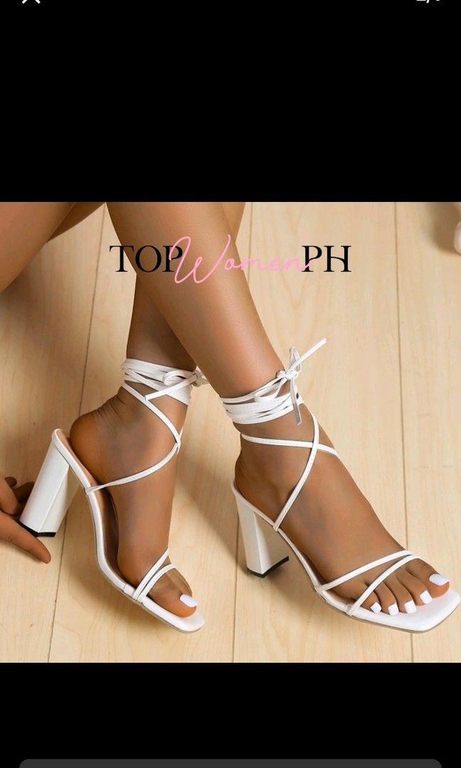 White Strappy Lace-Up Block Heels (Category: Sandals) located in Las Pinas. Submitted by cozychic19 (Listing ID 1454445340, Image 3). Description: Featuring an open square toe and delicate wrap-around ankle ties RFS: Wrong Size With box Minor scuffing, peeling, marks on the heel edge.