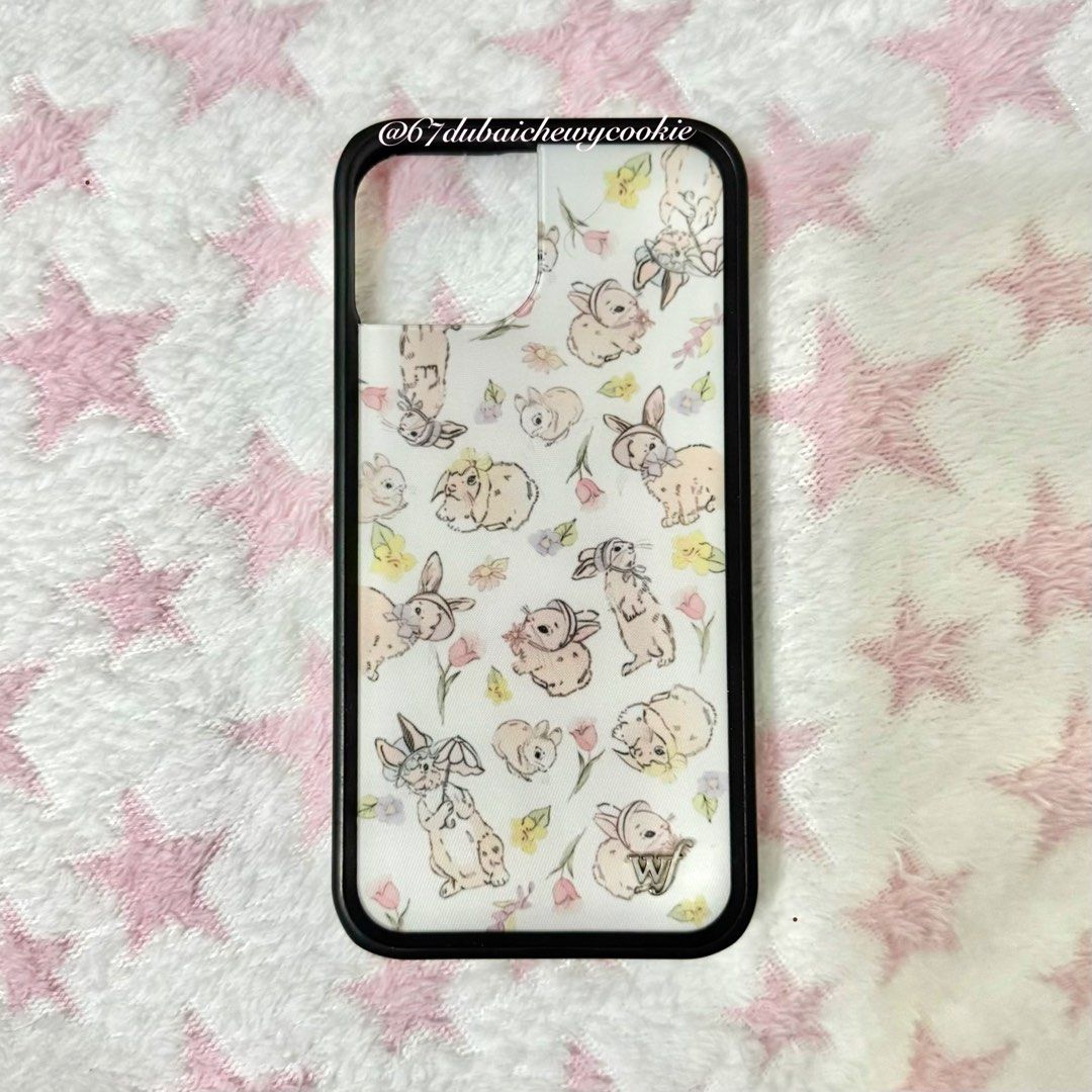Wildflower Bunnies in Bonnets Case iPhone 13/14 (Category: Cases & Sleeves) located in Silang. Submitted by 67dubaichewycookie (Listing ID 1454519034, Image 1). Description: 🐇 Negotiable! 🎀 ORIGINALLY: ₱296 from 🍊 🎀 Compatible for iPhone 13/14 🎀 Has scratches/signs of use but overall still good quality! Super similar to the auth version 📦 Shipping via SDD and J&T in Cavite/Laguna area schedule: Sunday-Tuesday 📦 Shipping via SDD in Metro Ma