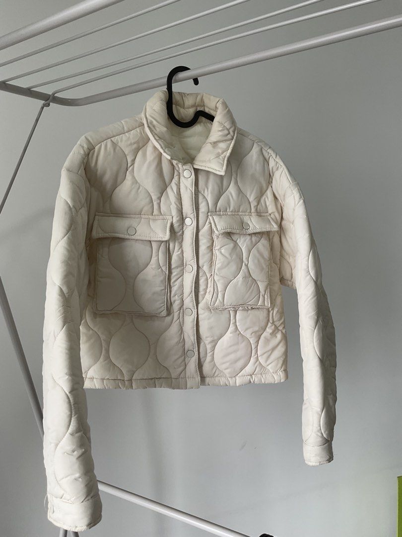 Winter Jacket (Category: Coats, Jackets and Outerwear) located in Kuala Lumpur. Submitted by kanon1735 (Listing ID 1454462049, Image 2). Description: Lightweight cream-colored quilted jacket with a button-up front and two front pockets. Simple and easy to match with casual outfits. Suitable for cool weather and everyday wear..