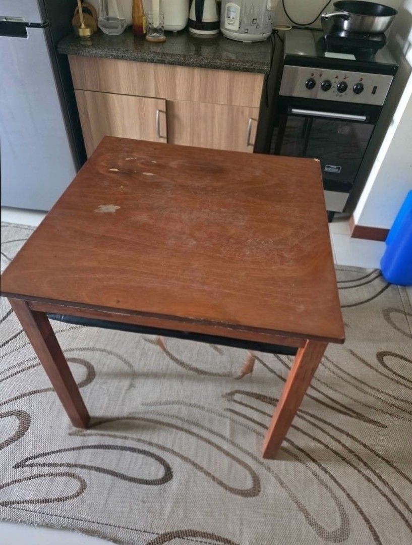 Wooden Dining Table Square (Category: Tables & Sets) located in Makati City. Submitted by jesfel15 (Listing ID 1452817182, Image 1). Description: - Wooden dining table ONLY. perfect for small spaces.( With Issue ) 30inchx30inch size Negotiable lalamove pick up COD Guadalupe Makati Area.