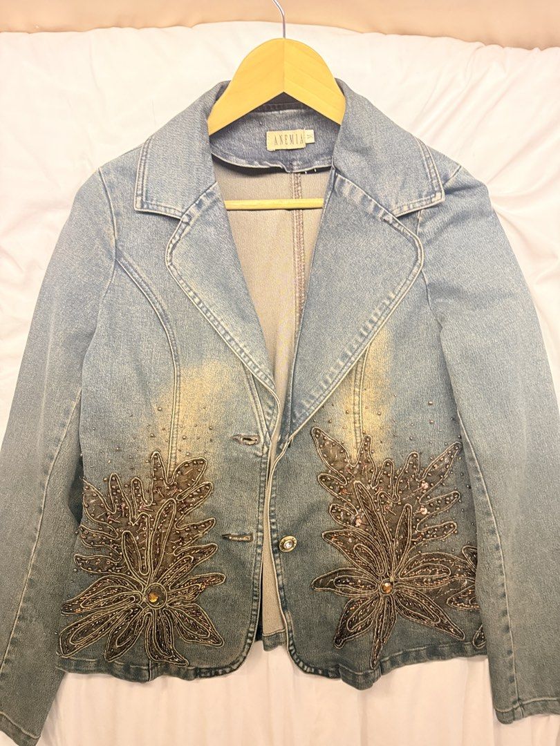 Y2K Washed Embroidered Denim Jacket (Category: Coats, Jackets and Outerwear) located in Quezon City. Submitted by ccmirae (Listing ID 1454473877, Image 1). Description: Brand Name – Anemia Size – M, Jacket Length=22”, Sleeve=23”, Color – Brown Material – Shell:65% Cotton, 35% Polyester; Lining: 100% Polyester 2 Buttons on the Jacket Front.
