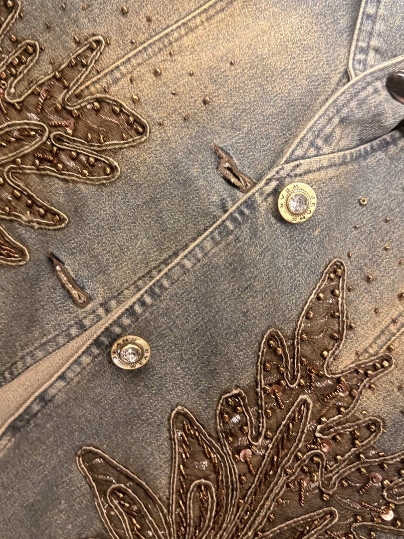 Y2K Washed Embroidered Denim Jacket (Category: Coats, Jackets and Outerwear) located in Quezon City. Submitted by ccmirae (Listing ID 1454473877, Image 3). Description: Brand Name – Anemia Size – M, Jacket Length=22”, Sleeve=23”, Color – Brown Material – Shell:65% Cotton, 35% Polyester; Lining: 100% Polyester 2 Buttons on the Jacket Front.