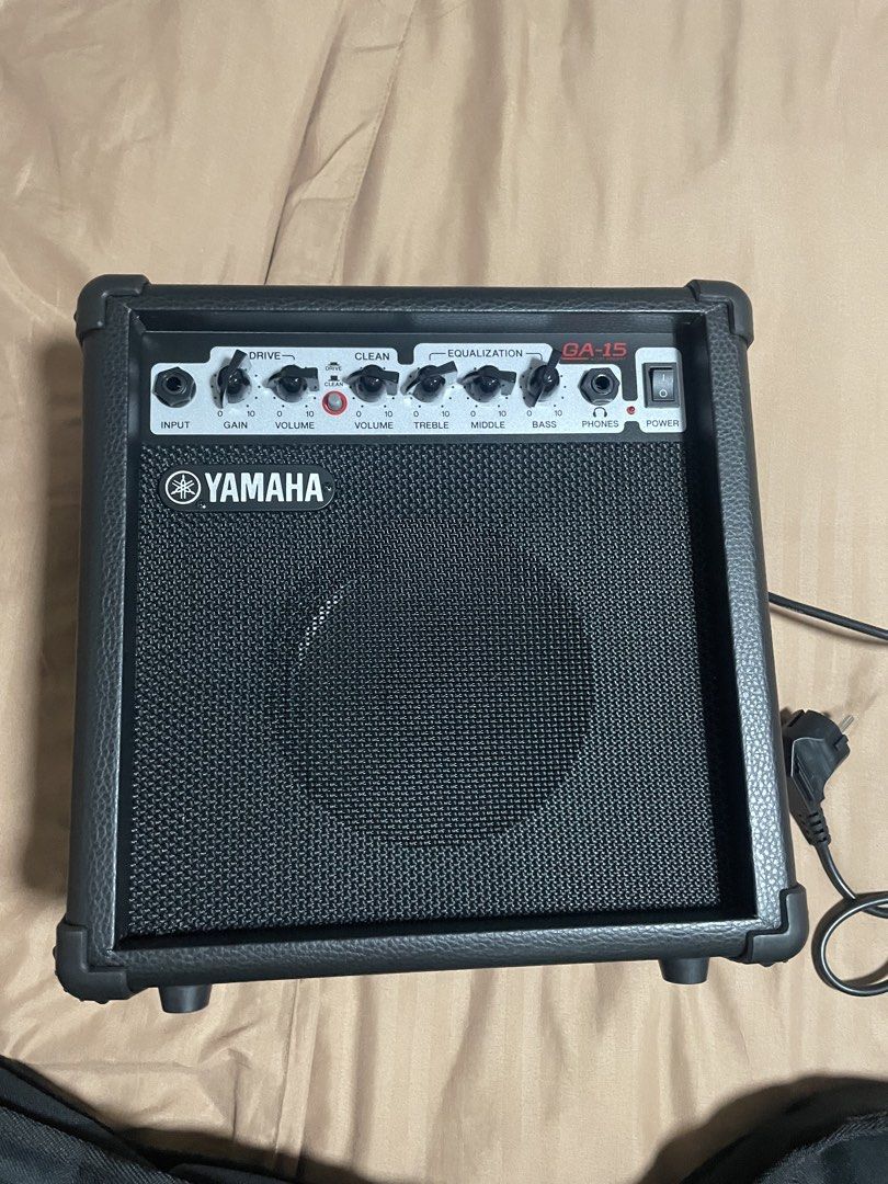 Yamaha Electric Guitar ERG 121C with Amplifier (Category: Musical Instruments) located in Quezon City. Submitted by sparkleph (Listing ID 1454392149, Image 1). Description: Bought only last Jan Rarely used Comes with amplifier, guitar bag, tuner, picks, and extra string Rfs: not using.