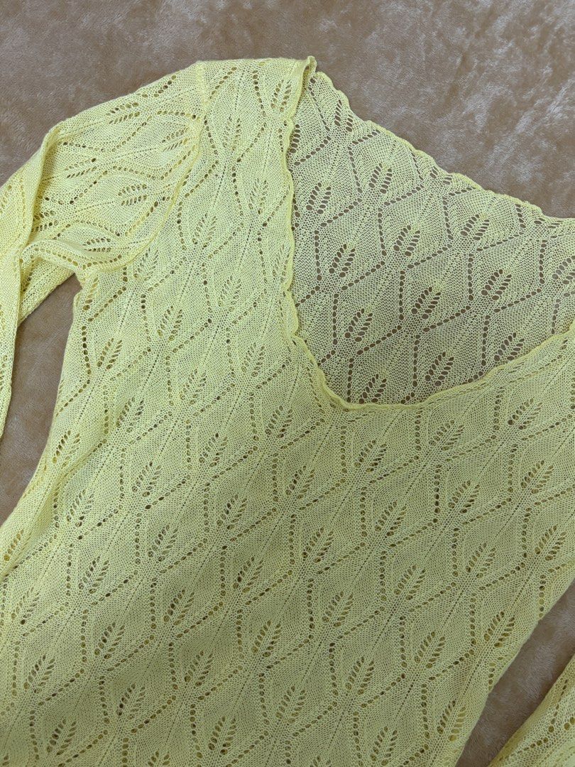 Yellow Knit Long Sleeve Top (Category: Longsleeves) located in Manila. Submitted by lovedbynabix (Listing ID 1454413830, Image 2). Description: - Adorable yellow crochet knit top - Long sleeves - Flattering V-neckline - All-over diamond knit pattern - Versatile for casual outings or layering - Pairs perfectly with jeans.