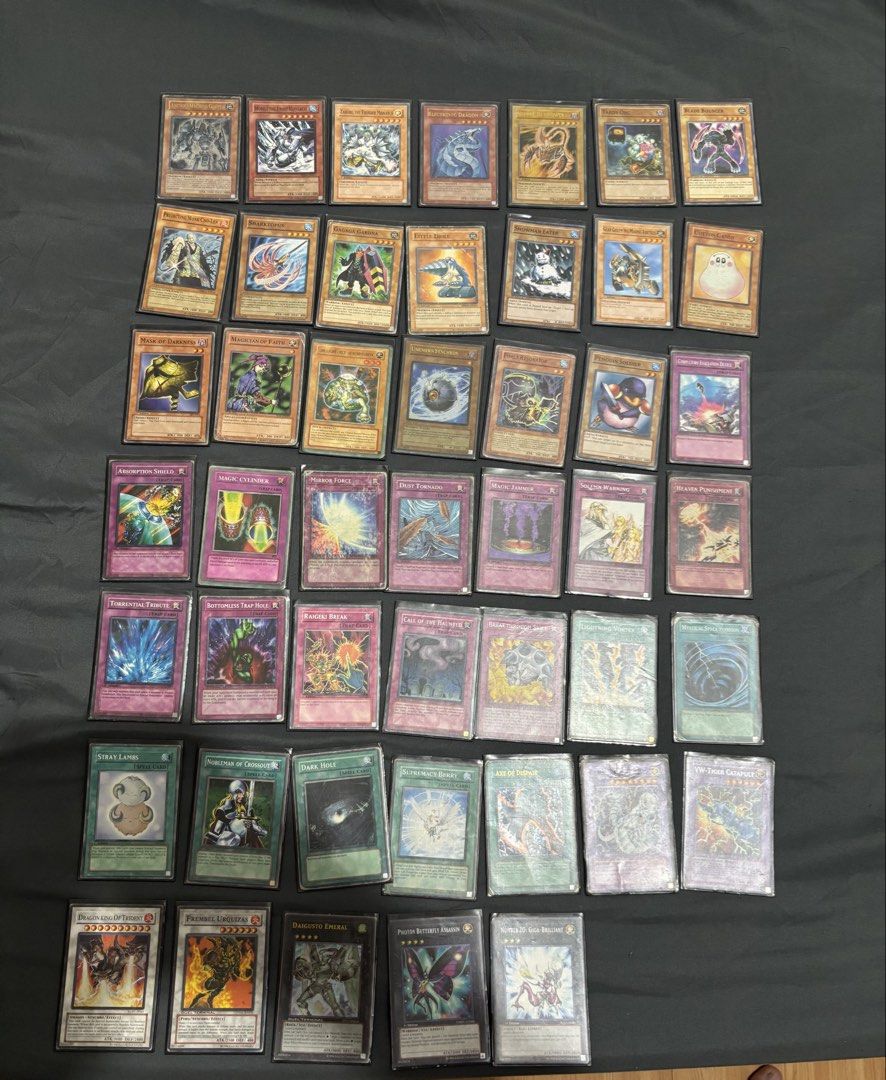 Yugioh - Old Main Deck with card sleeves (Category: Raw Singles) located in Muntinlupa City. Submitted by laplace_transform (Listing ID 1454498838, Image 1). Description: Includes: Main deck Extra Deck Side Deck All with card sleeves Total cards = 59.